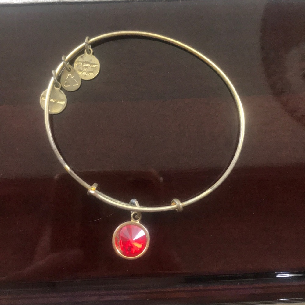 Gold Alex and Ani Ruby pendant bracelet